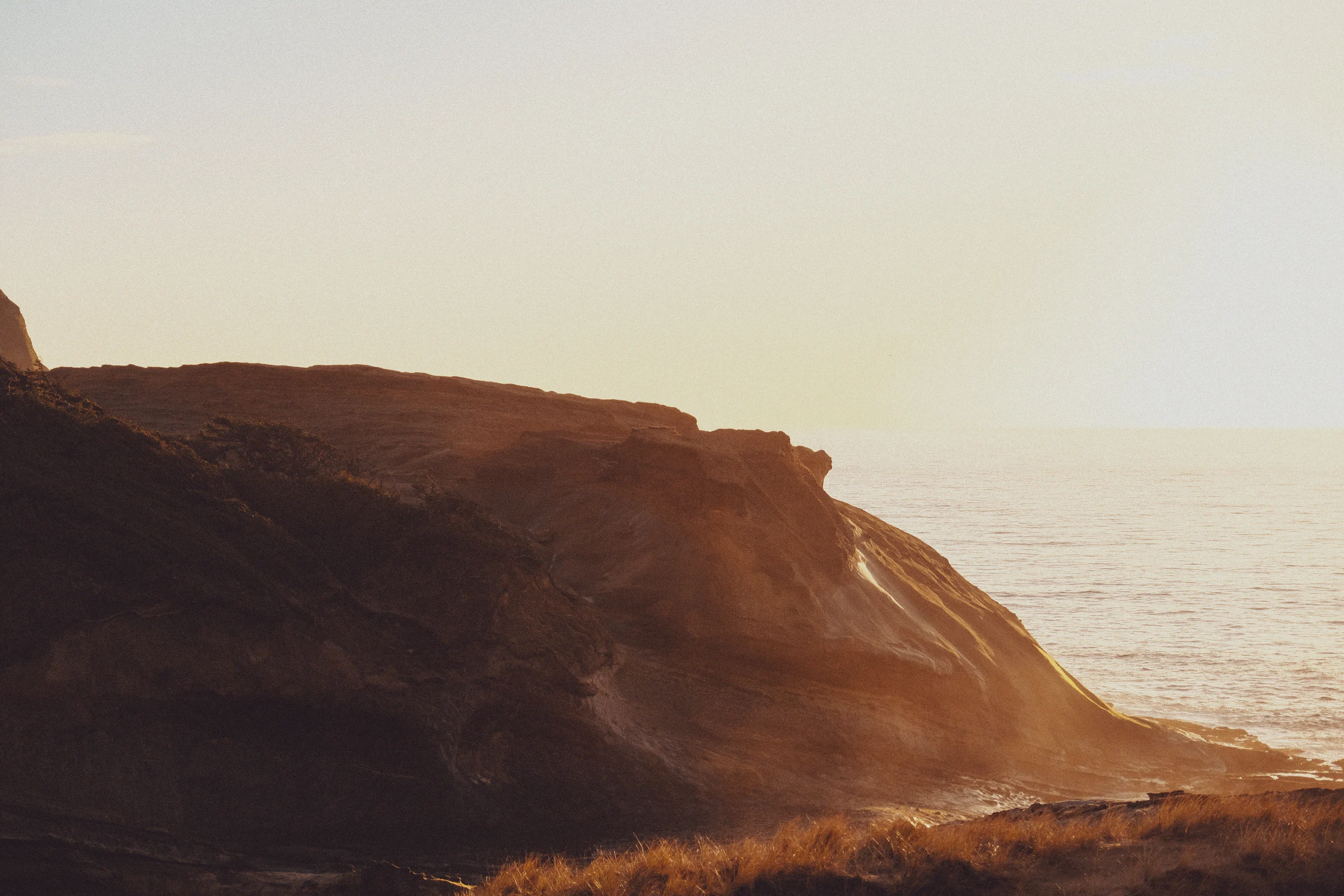 el wedos where the wind blows cape kiwanda rock formation sunset